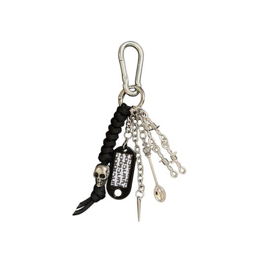 Silver skull charm